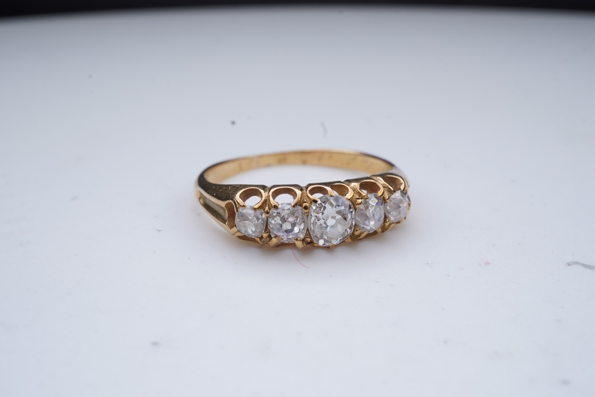 A Victorian five-stone diamond ring, late 19th century